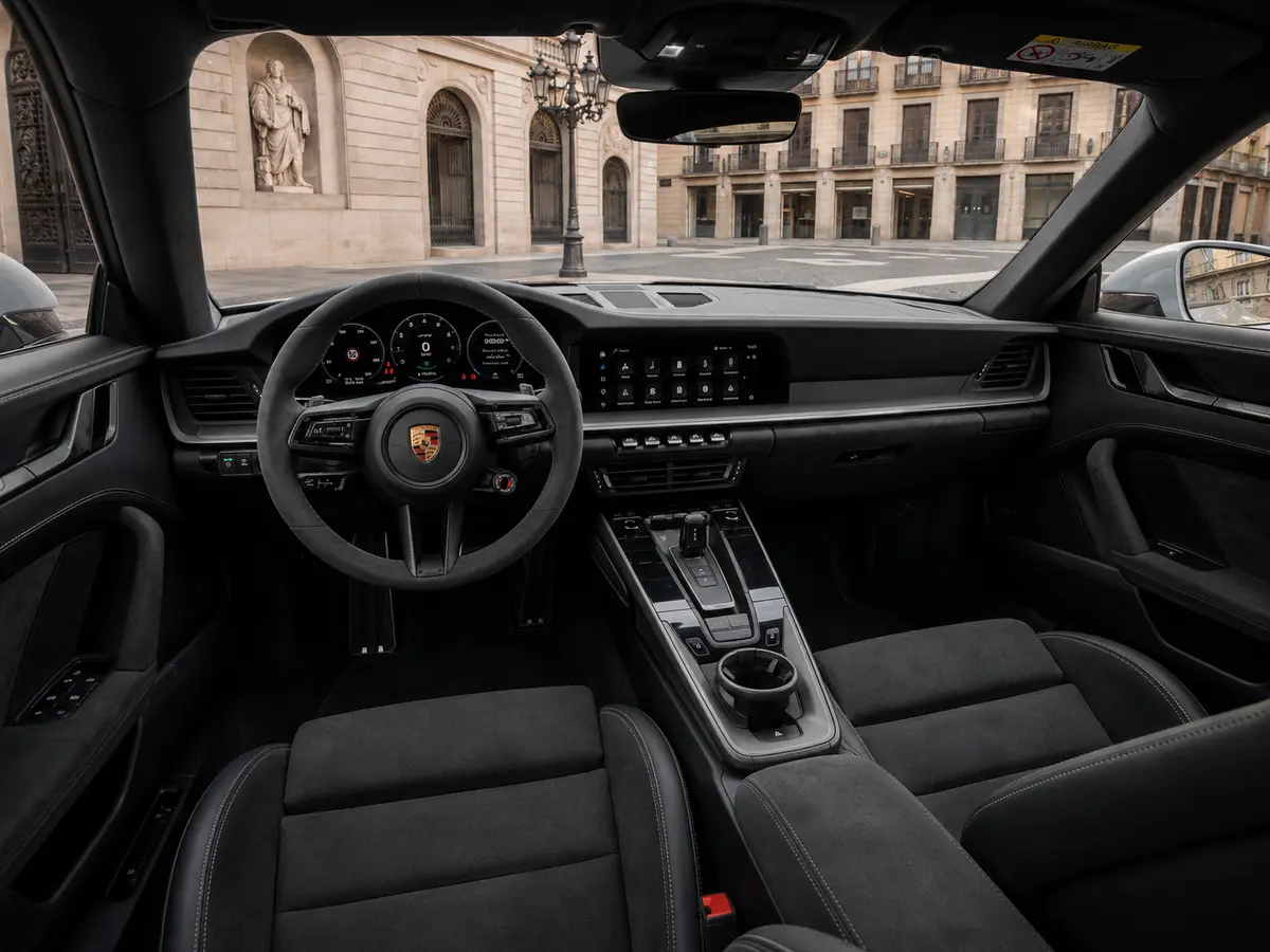 Porsche Carrera Spyder 992,2 GTS 2025, interior — Lisbon Luxury Car Rental, Lisbon. The 2025 Porsche Carrera Spyder 992.2 GTS pairs 541 hp with an open-top layout that keeps…