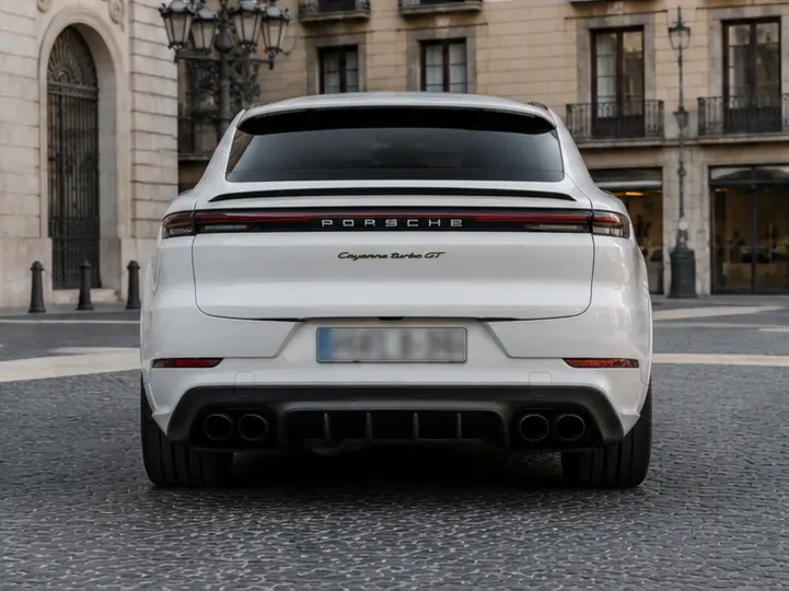 Porsche Cayenne Turbo E-Hybrid Coupé GT 2026, rear view — Lisbon Luxury Car Rental, Lisbon. The 2026 Porsche Cayenne Turbo E-Hybrid Coupé GT pairs 739 hp with a coupé roofline, a…