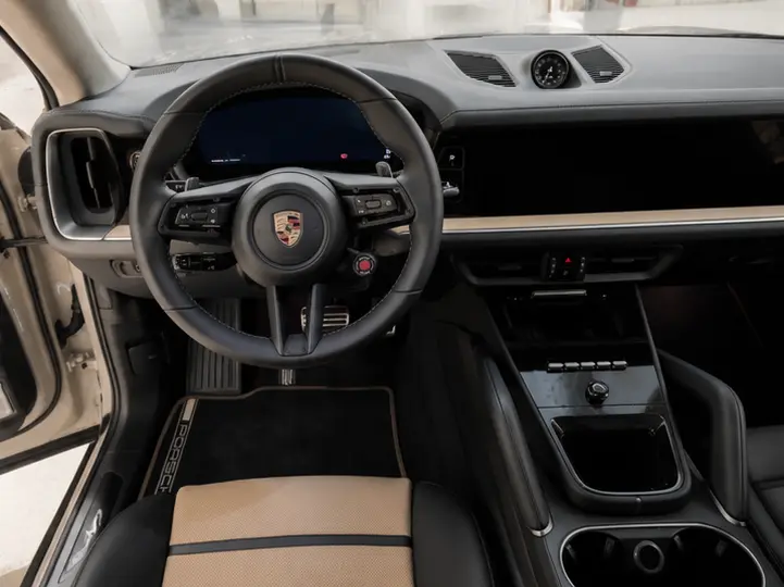 Porsche Cayenne Turbo E-Hybrid Coupé GT 2026, interior — Lisbon Luxury Car Rental, Lisbon. The 2026 Porsche Cayenne Turbo E-Hybrid Coupé GT pairs 739 hp with a coupé roofline, a…