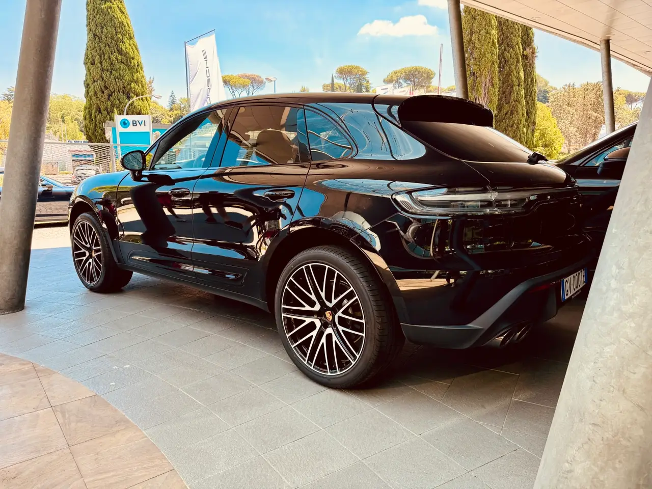 Porsche Macan 2024, rear view — Lisbon Luxury Car Rental, Lisbon. The 2024 Porsche Macan brings a compact, well-balanced footprint to a segment often…